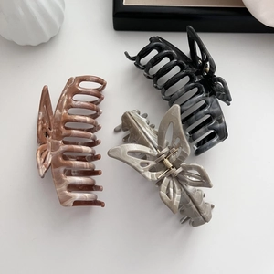 Vintage marble butterfly hair claw clips in grey and brown for thick hair styling