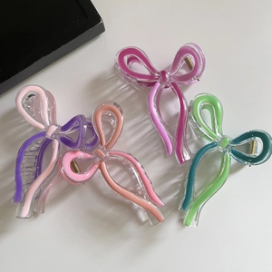 Set of four colorful butterfly ribbon hair claws in pink, purple and green acrylic