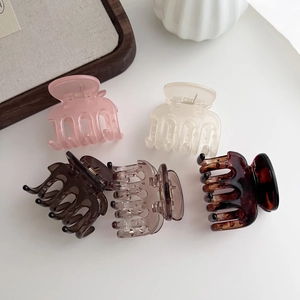 Set of 5 stylish hair claw clips in pink and brown tones for elegant hairstyles
