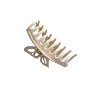 Elegant large butterfly hair claw clip in cream beige with marble ink texture