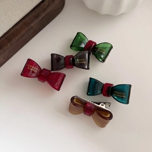 Five pieces of colorful acetate bow hair clips with gold label for women and girls