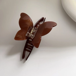 Elegante molletta per capelli a farfalla in acetato ambrato con molla in metallo oro