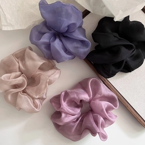 Elegant oversized sheer tulle scrunchies in lavender, black, champagne, and dusty pink