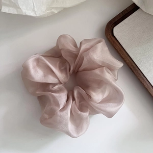 Champagne pink organza scrunchie with shimmering texture for French style hairstyles