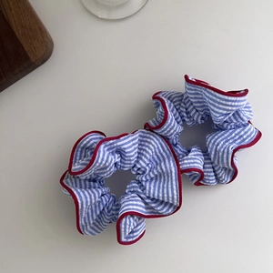 Blue and white striped scrunchies with red piping detail, pack of two in high resolution