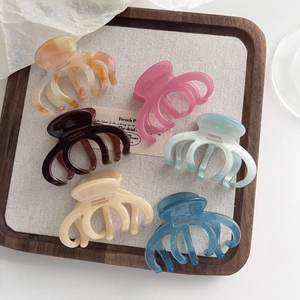 Set of 6 French style acetate pumpkin hair claws in assorted elegant colors for women