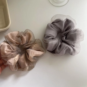 Elegant double-layered mesh hair scrunchies in champagne gold and deep grey colors