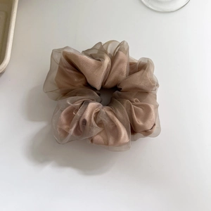 Elegant champagne mesh scrunchie with layered organza fabric and pleated satin texture