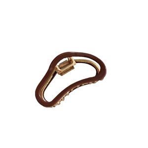 Deep brown minimalist acetate cloud shark clip with gold metal frame for elegant hair styling