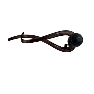 Minimalist brown twisted hair clip with large black pearl accent for women hair styling