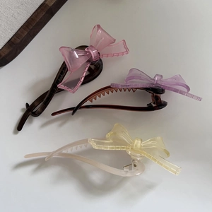 Lot de trois barrettes à nœuds translucides de style jelly en rose, violet et jaune