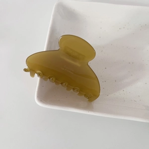 Pince à cheveux minimaliste en acétate vert avec lettrage Barrette La France doré