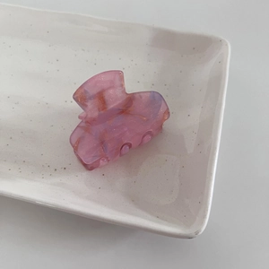 Starry shimmer pink acetate hair claw clip with marble texture for elegant hairstyles