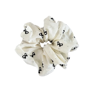 Elegant white satin scrunchie with black bow print and rhinestones for women