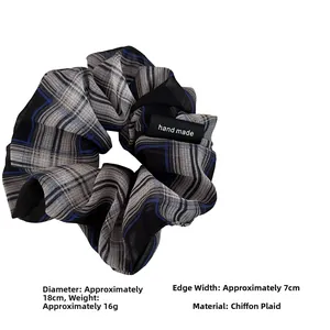 Detail showing chiffon plaid scrunchie dimensions 18cm diameter and handmade label