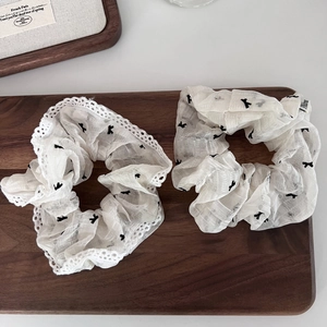 Set of two white lace organza scrunchies with black bow prints for women's hair accessories