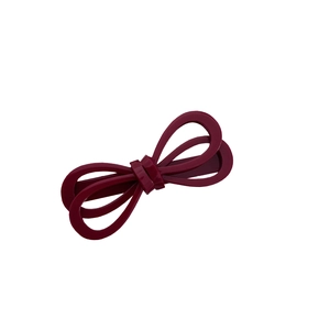Elegant deep red acetate bow hair clip with double-layer hollow design on white background