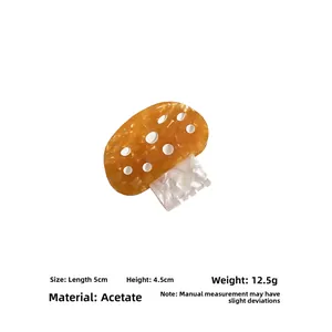 Nahaufnahme der 5cm Pilz-Acetat-Haarklammer mit Größenangaben und Marmor-Textur-Details