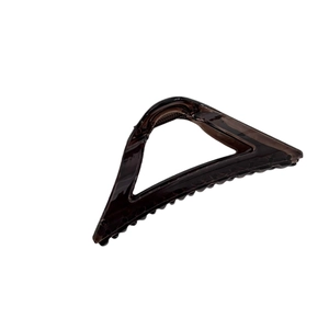 Translucent dark coffee large triangular shark hair claw clip on white background