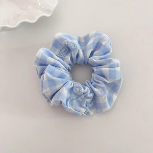 Blue and white gingham scrunchie with detailed letter embroidery for women's hairstyles