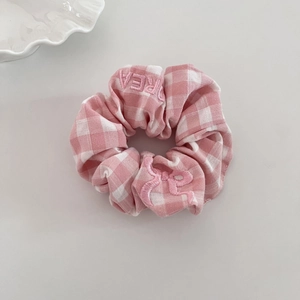 Pink and white checkered scrunchie with sweet embroidery bow for elegant hairstyles
