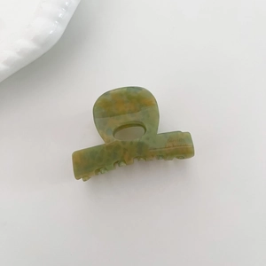 Pince à cheveux en acétate irisé avec texture marbrée et gravure Barrette La France