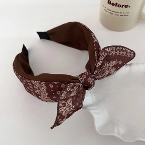 Brown paisley bow headband with vintage paisley print and comfortable side tips