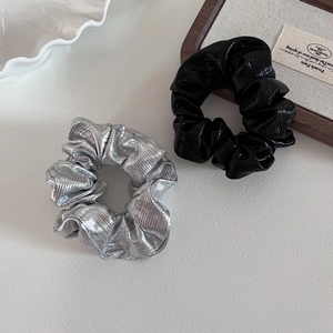 Silver and black metallic pleated scrunchies set for elegant ponytail styling