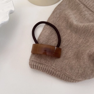 Minimalist acetate geometric rectangle hair tie with amber tortoiseshell pattern detail