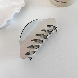 Classic large beige acetate hair claw clip with black trim for French style updos
