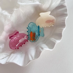 Three-piece transparent hair claw clip set with cute fish design in pink, blue and white