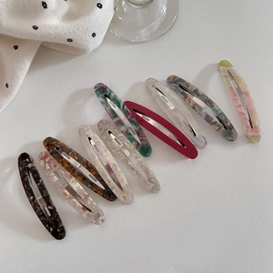 Set of 10 tortoiseshell acetate oval hair clips with marble patterns and vintage colors