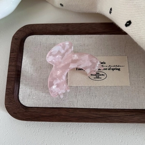Elegant pink marble acetate arch hair claw clip for women in Korean minimalist style
