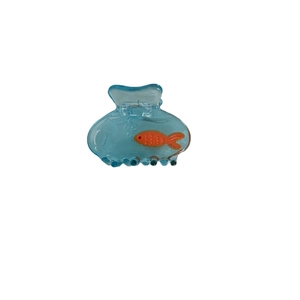 Transparent blue acrylic hair claw clip with orange fish pattern and ocean design