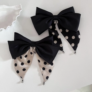 Elegant French style black satin hair clip with white polka dot ribbons and bead details