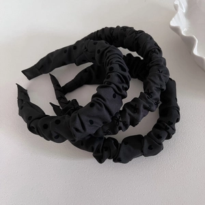 Three-piece black headband set featuring polka dots, bows, and heart pleated fabric designs