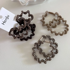Set of 4 minimalist wavy zebra pattern hair ties in brown and beige earth tones