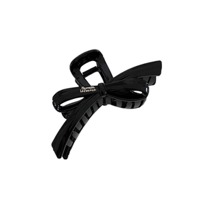 Glossy black bow-shaped hair claw clip with Barrette LaFrance text on white background