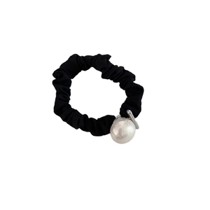 French style black pleated scrunchie with a large white pearl bead and silver hardware