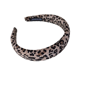 Classic leopard print headband with handmade label and high-quality fabric finish