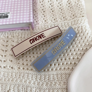 Minimalist GROVE letter rectangular spring hair clips in cream and purple acrylic