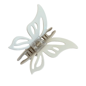 Elegant hollow butterfly hair claw clip in creamy beige acetate with metal spring