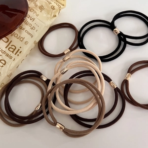 Elastici per capelli marroni a doppio filo con perline dorate in toni terra neutri