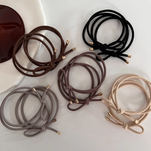 Set of 5 elastic bow hair ties in coffee tones with gold accents for women