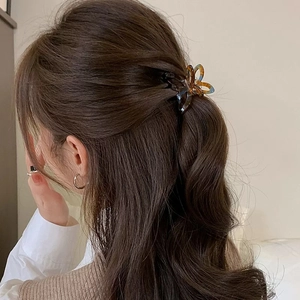 French retro acetate bow hair claw clip in tortoiseshell pattern for half-up hairstyles