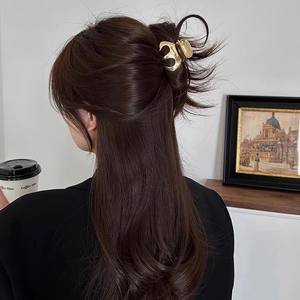 Elegant metallic pumpkin hair claw clip for women's half-up or bun hairstyles