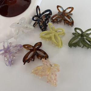 French vintage style acetate hollow butterfly hair claw clips in various marble patterns