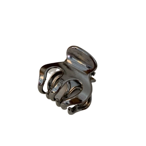 Minimalist gunmetal pumpkin hair claw clip with glossy metallic finish for women