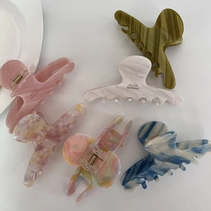 Set of 6 premium acetate shark hair claws in assorted pastel marble patterns for women