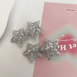Sparkly Y2K black star hair clips with silver glitter finish for women's hair styling